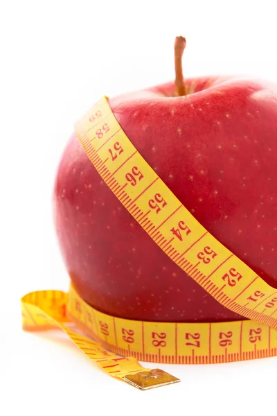 苹果与测量卷尺. — 图库照片