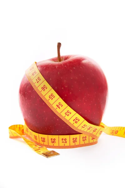 苹果与测量卷尺. — 图库照片