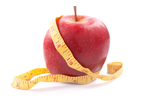 Apple with a measuring tape. — Stock Photo, Image