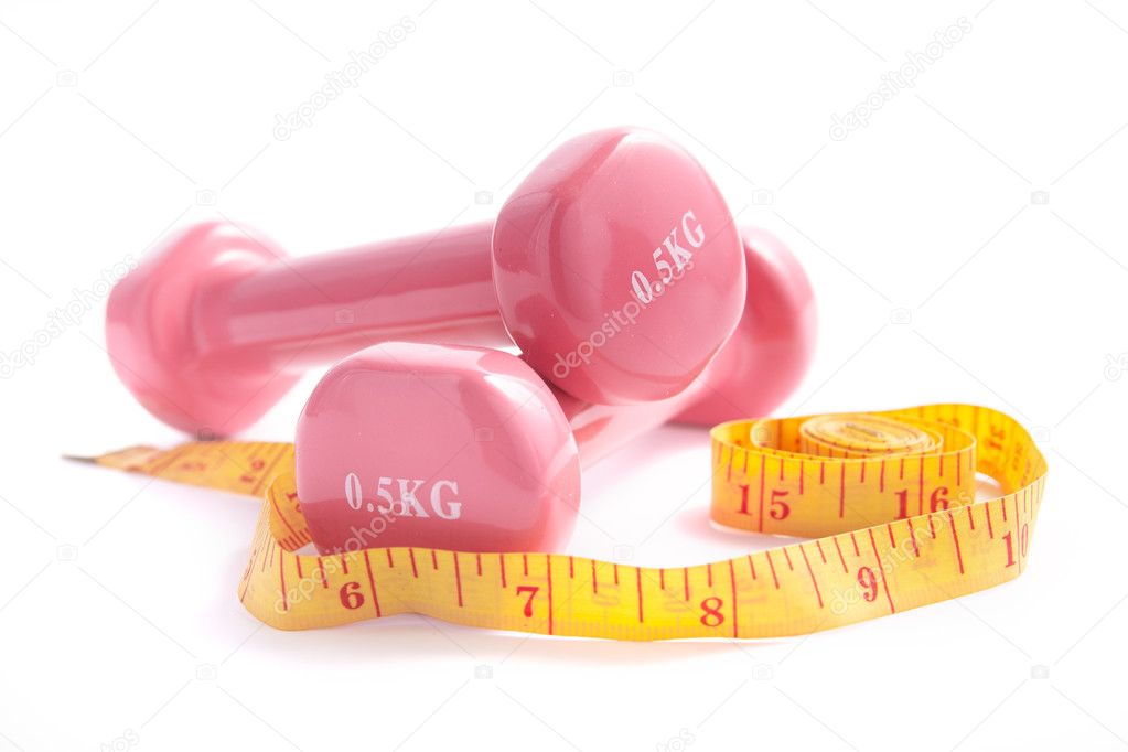 Pink dumbbells with a measuring tape.