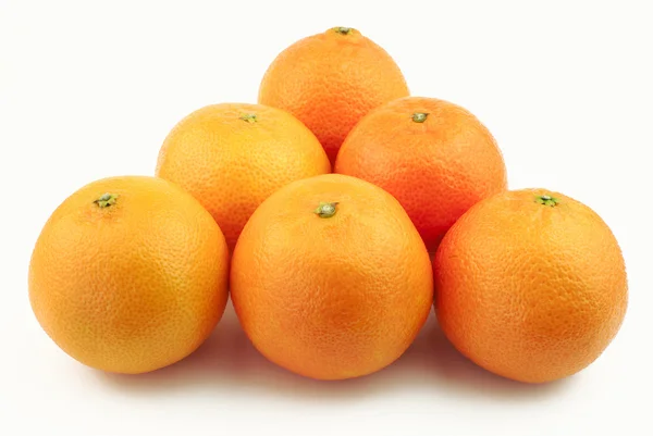 Triangle made of mandarins — Stock Photo, Image