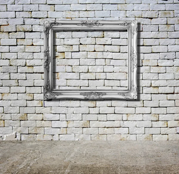 Old frame against wall — Stock Photo, Image