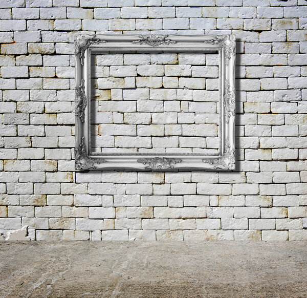 Old grunge interior frame against wall