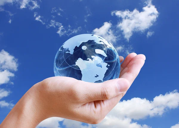 Holding globe in his hand — Stock Photo, Image