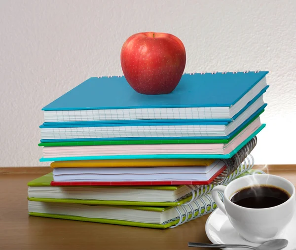 Stack of books and apple — Stock Photo, Image