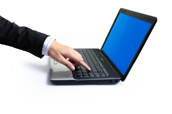 Forefinger pointing at laptop — Stock Photo, Image