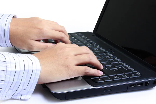 Hands on a laptop — Stock Photo, Image