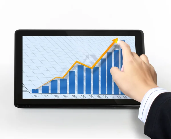 Pointing on touch screen graph on a tablet — Stock Photo, Image