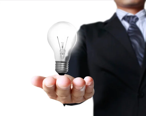 Light bulb in a hand — Stock Photo, Image