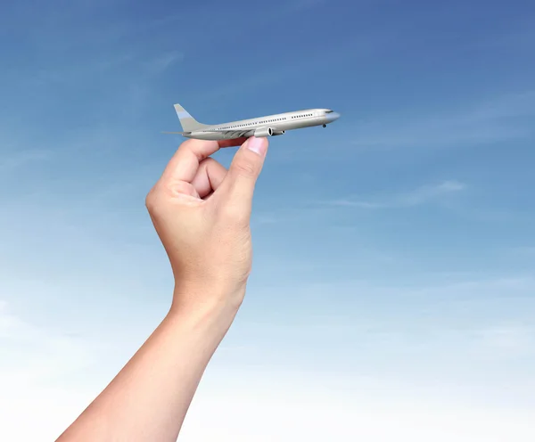 Vliegtuig in de hand — Stockfoto