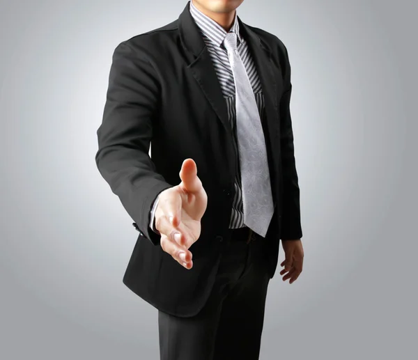 Homem de negócios com uma mão aberta pronta — Fotografia de Stock