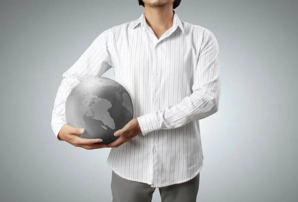 Holding a glowing earth globe in his hands — Stock Photo, Image