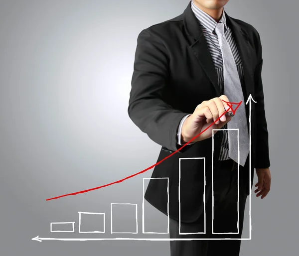 Homens de negócios mão desenhando um gráfico de crescimento — Fotografia de Stock