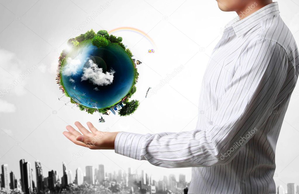 Earth globe in his hands