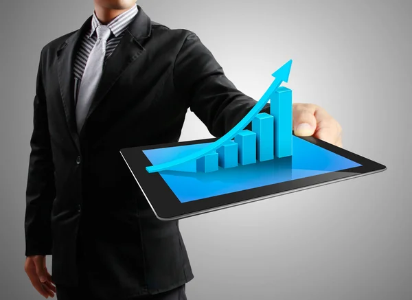 Businessmen and ,graph on a tablet — Stock Photo, Image