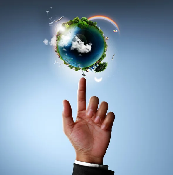 Pointing glowing earth globe — Stock Photo, Image