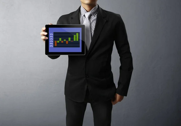Businessmen, and graph on a tablet — Stock Photo, Image