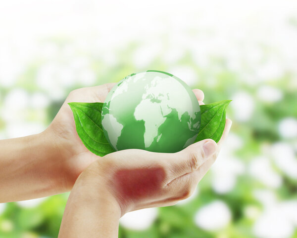 Earth globe in his hands