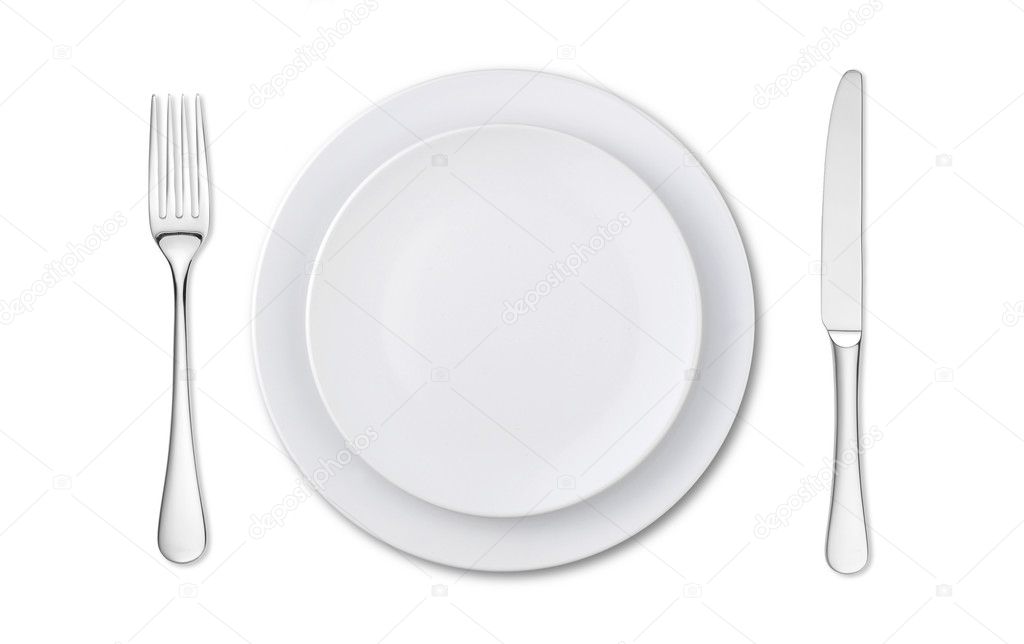 Overhead view of an empty place setting isolated on white
