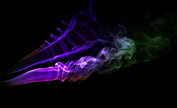 Abstracte kleurrijke achtergrond gemaakt met echte rook — Stockfoto