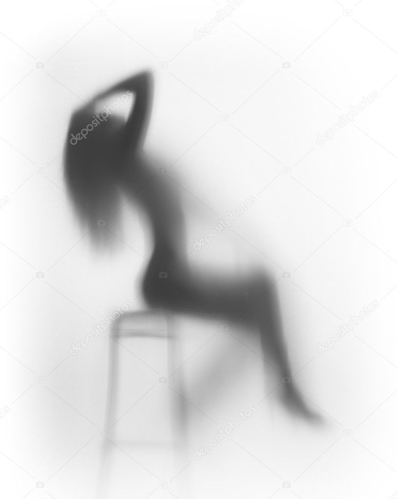Sexy diffuse sitting woman silhouette, long hair