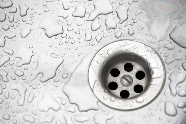 Sinkhole and water drops — Stock Photo, Image