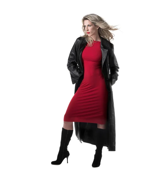 Beautiful, slim blonde woman, red dress, black leather coat — Stock Photo, Image