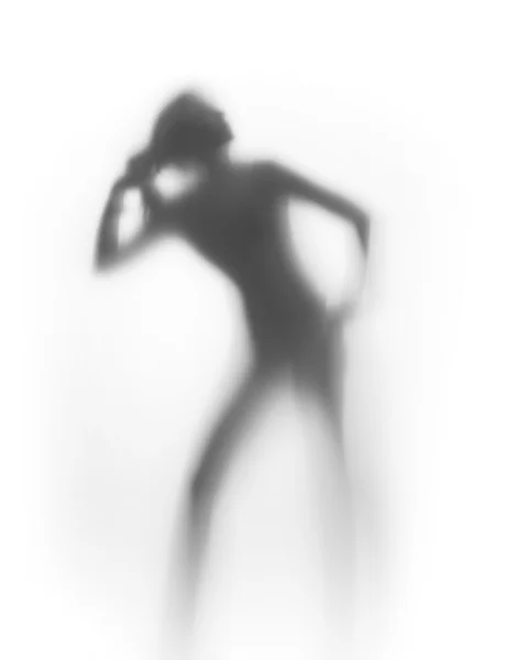 Nice woman pulls her hair, silhouette — Stock Photo, Image
