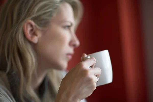 stock image Morning drink, and blonde woman face behind