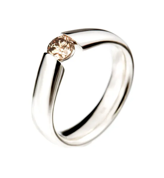 Simple white gold ring and cognac diamond — Stock Photo, Image
