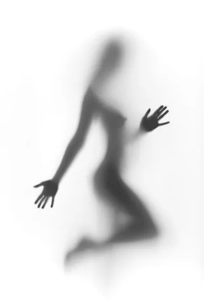 Сексуальная женщина рассеивает абстрактность — стоковое фото