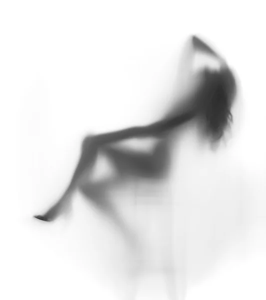Sexy diffuus zittende vrouw silhouet, lange haren — Stockfoto