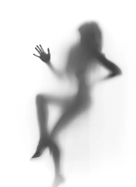 Sexig diffusa sittande kvinna silhouette, långt hår — Stockfoto