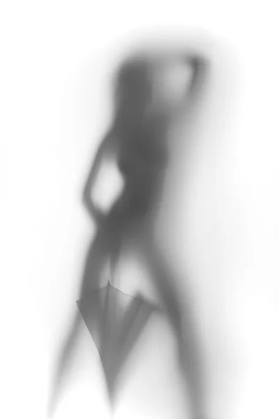 Сексуальная женщина танцует с зонтиком — стоковое фото