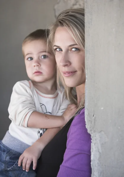 Beautiful blonde woman and her little son together — Stock Photo, Image