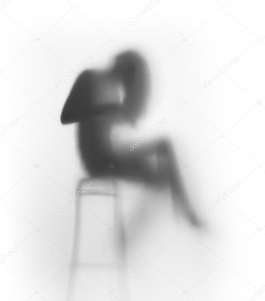 Beautiful long hair woman sits on chair, silhouette