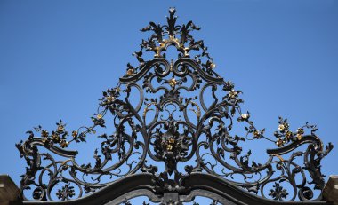 Medieval ornamented fence detail of a kingly castle's garden clipart