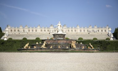 Sculpture of a mother and childs in garden the Royal Palace of Versailles, France clipart