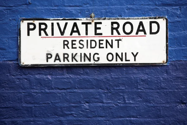 stock image Private Road notice sign hang on blue brick wall