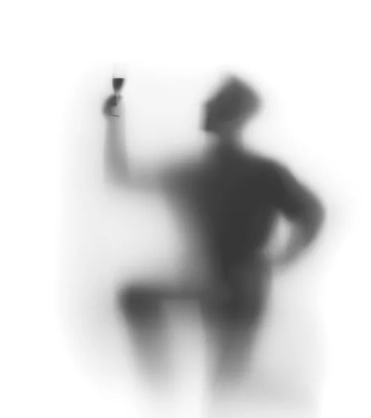 Человек празднует с бокалом вина — стоковое фото