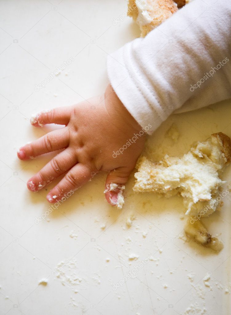 Baby hand with remains of meal