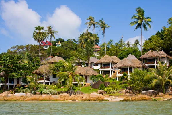 stock image Tropical house on the beach