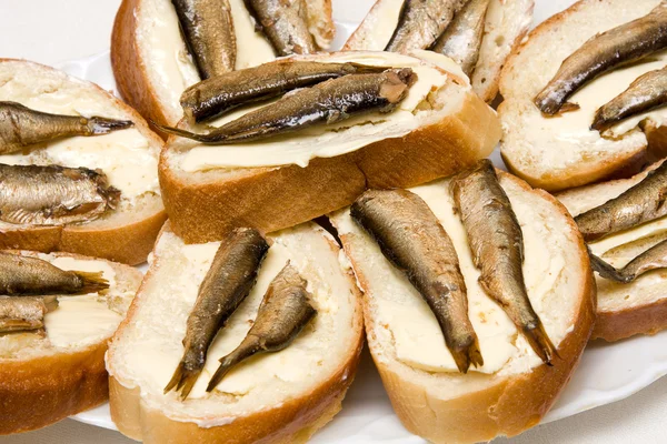 Sandwiches with sprats — Stock Photo, Image