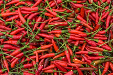 Background of closeup red hot peppers clipart