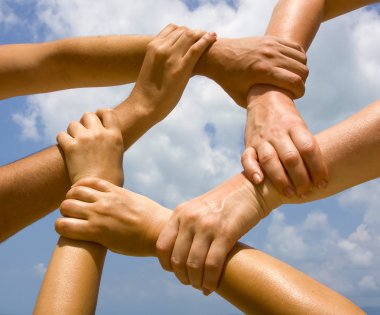 Many hands connecting to a chain with sky clipart