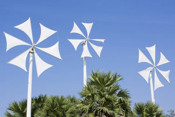 stock image White wind turbine generating electricity