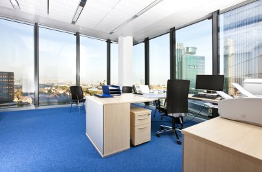 Modern business office with panoramic cityscape clipart