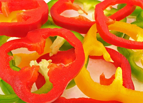 Pile of slices of colorful capsicums — Stock Photo, Image