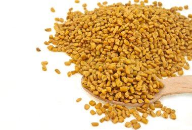 Pile of fenugreek seeds clipart