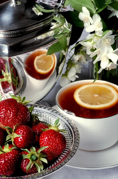 Stock image Strawberry and tea for a breakfast